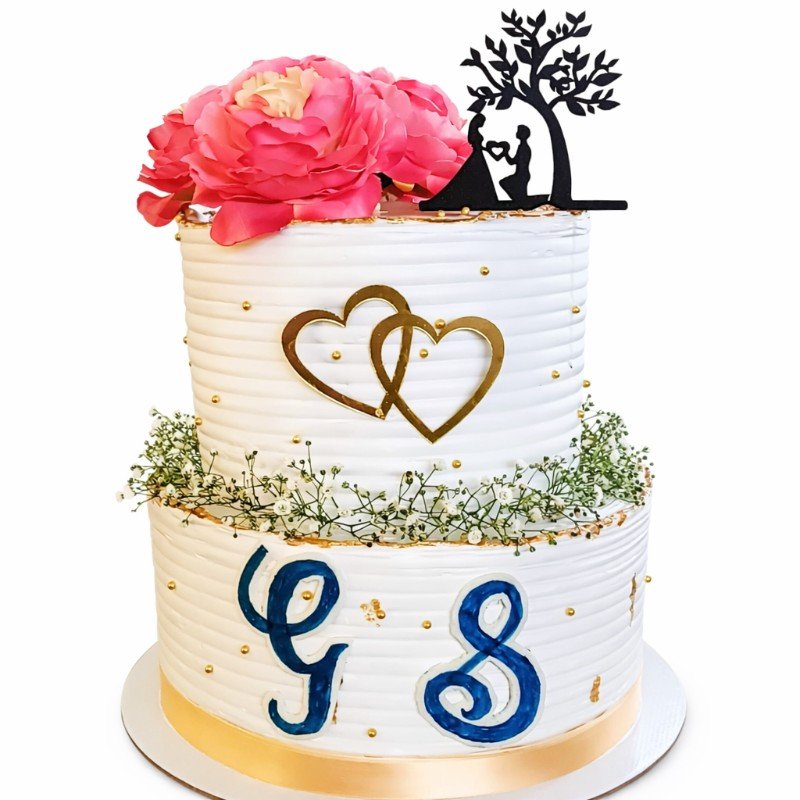 Elegant cake with couple silhouette topper